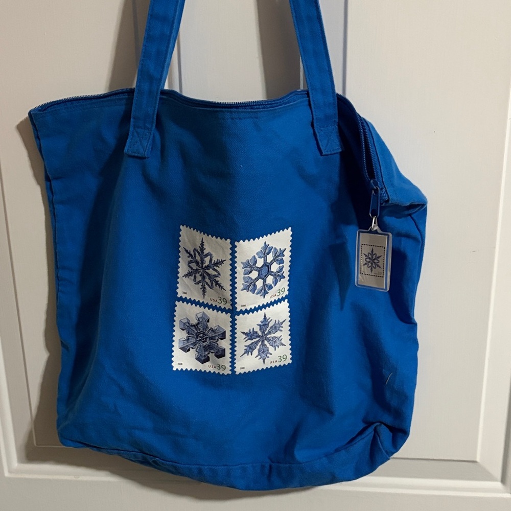 Charming 2006 USPS tote bag featuring snowflakes.